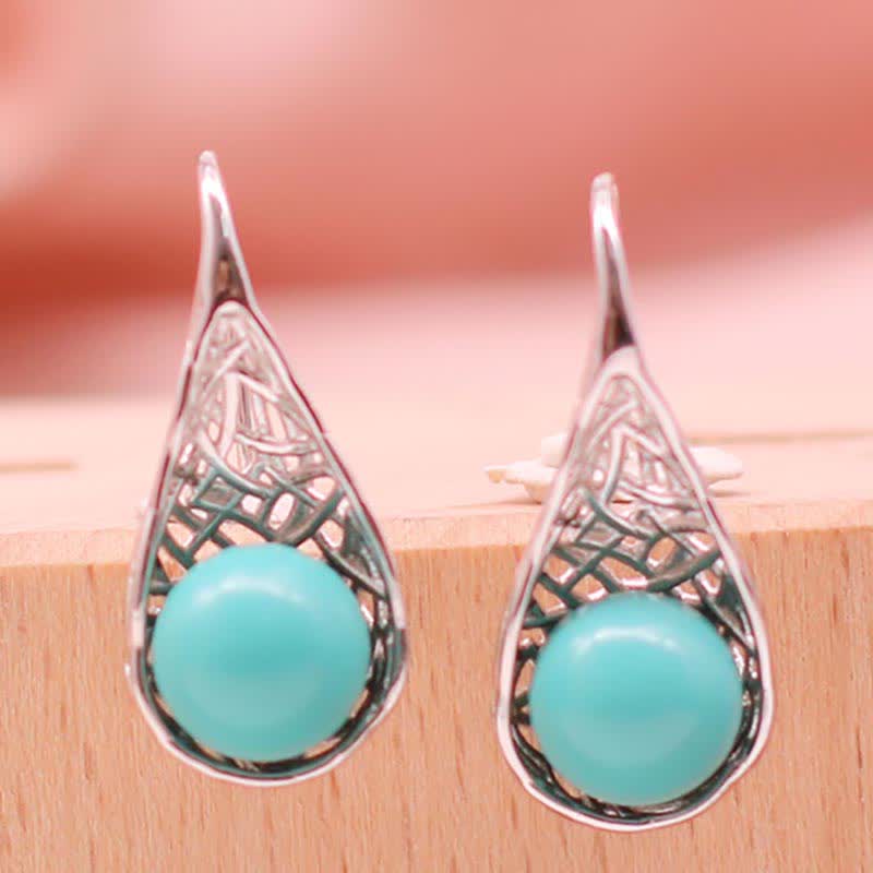 Boucles d'oreilles pendantes en argent sterling 925 avec Buddha Stones - image 1