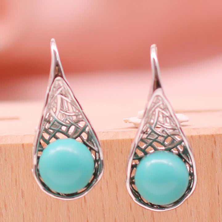 Boucles d'oreilles pendantes en argent sterling 925 avec Buddha Stones - image 1