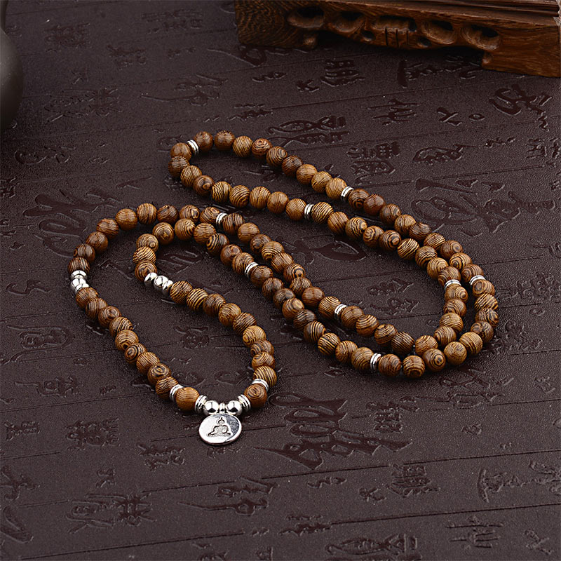 Bracelet tibétain en bois avec Buddha Stones et foudre