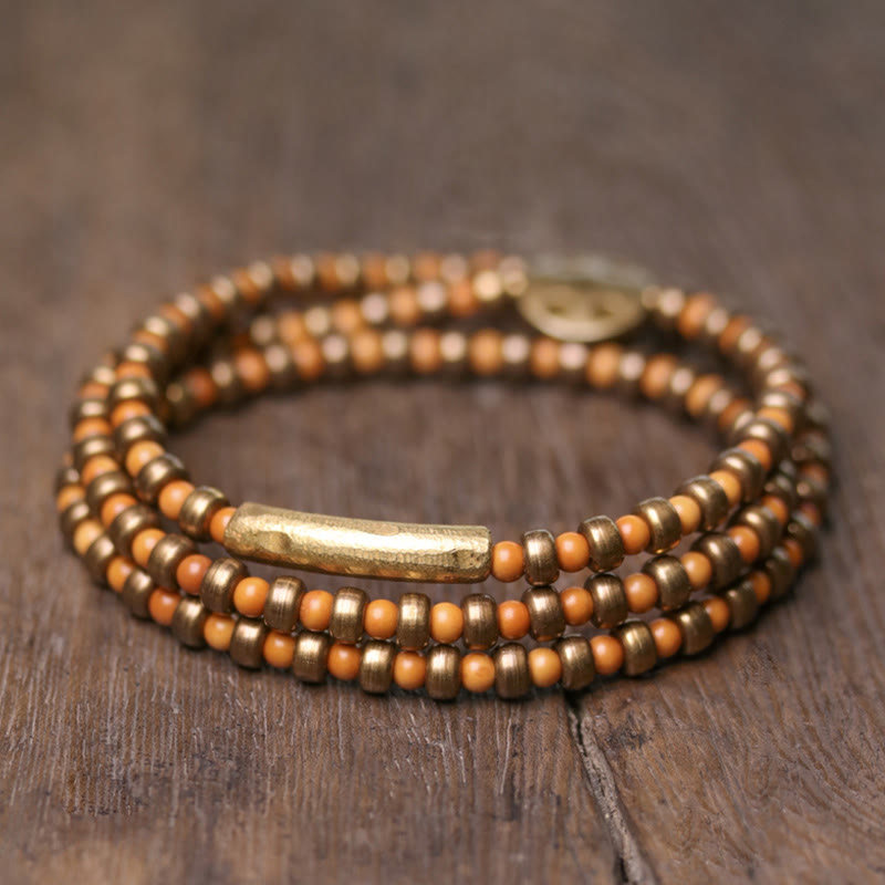 Bracelet de richesse rétro en cuivre avec noyau d'olive et Buddha Stones