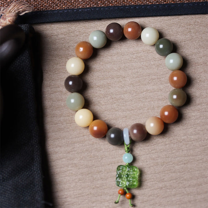 Bracelet de paix en verre Liuli avec perles de Bodhi en dégradé multicolore naturel et Buddha Stones