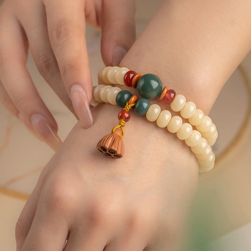 Bracelet double tour avec breloque en forme de gousse de lotus et graines de Bodhi et Buddha Stones