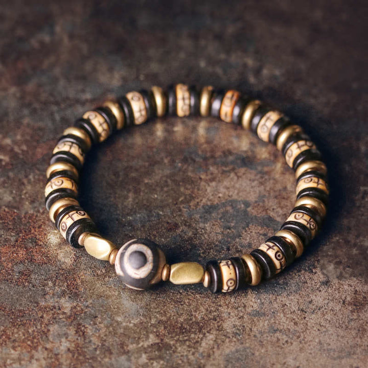 Bracelet de force en bois d'ébène et perles d'os tibétaines en Buddha Stones