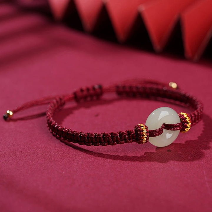Bracelet tressé en jade avec boucle de paix et Buddha Stones