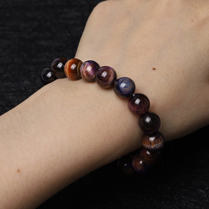 Bracelet de force de protection en œil de tigre violet naturel Buddha Stones