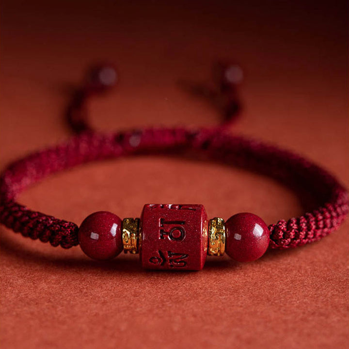 Bracelet tressé avec Buddha Stones tibétaines en cinabre Om Mani Padme Hum gravé et bénédiction