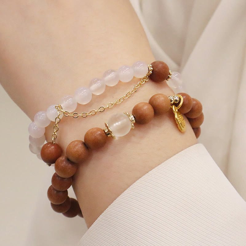 Bracelet de protection à breloques en bois de santal et œil de chat Fu avec Buddha Stones