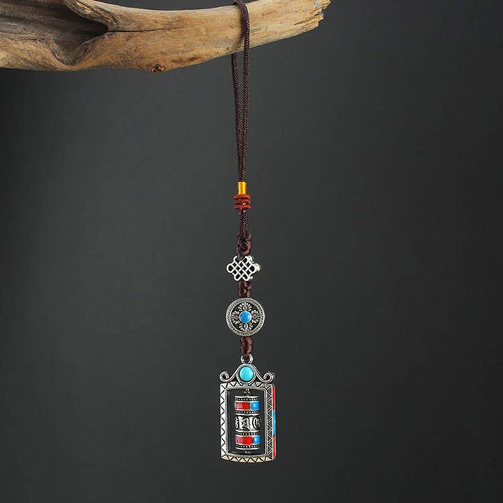 Porte-clés décoratif avec nœud rotatif et bénédiction en forme de roue de prière en six mots vrais en Buddha Stones
