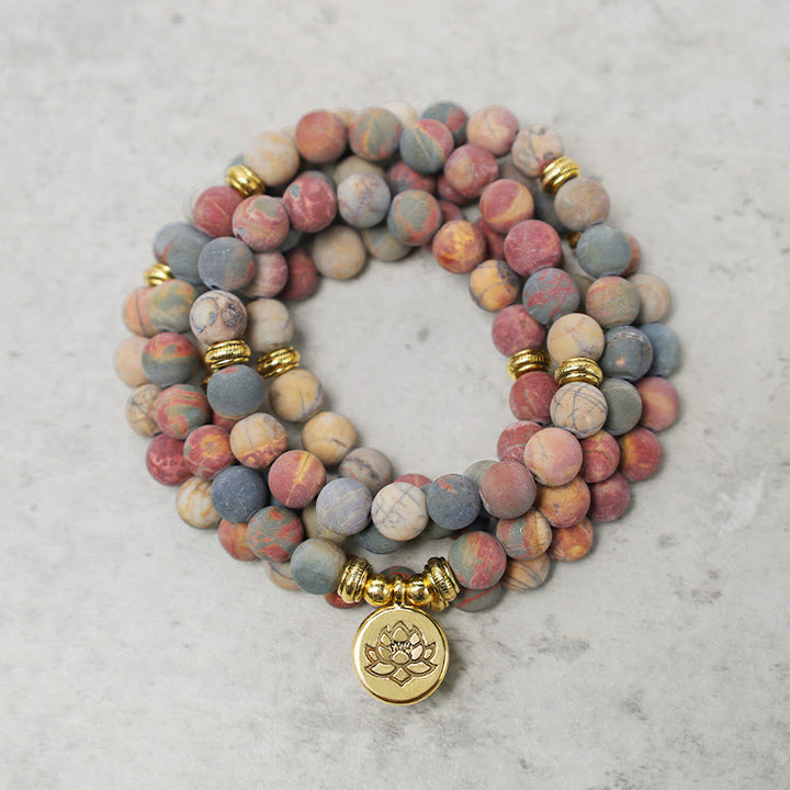 Bracelet énergétique courageux en pierre de jaspe Picasso avec 108 perles de Mala Buddha Stones