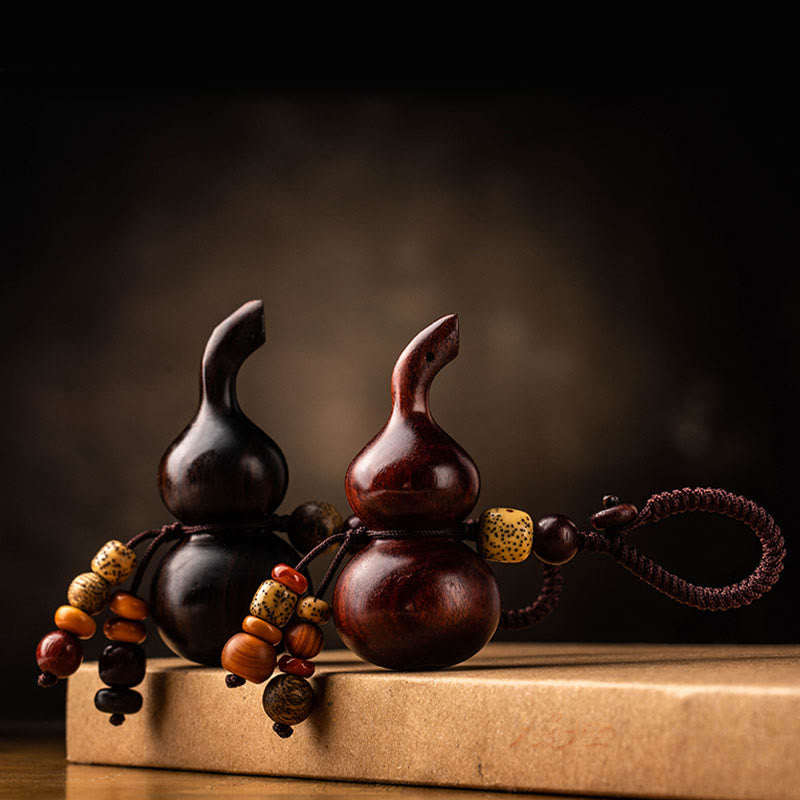 Porte-clés porte-bonheur en ébène tibétain à petites feuilles de gourde en bois de santal rouge