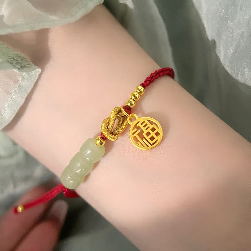 Bracelet porte-bonheur en corde rouge avec perles de jade fabriquées à la main par Buddha Stones