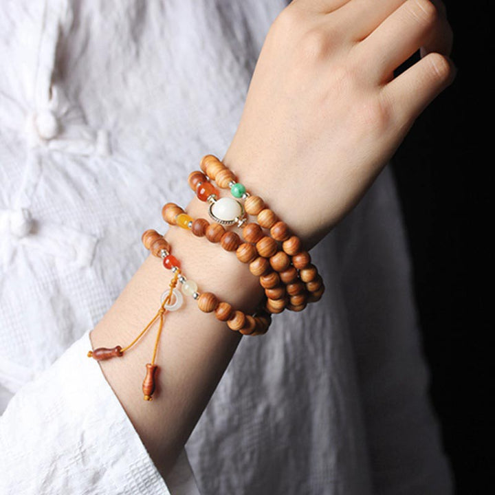 Collier et bracelet de guérison Mala en bois de rose tibétain avec Buddha Stones