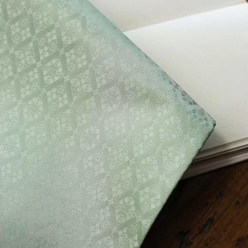 Dessous de verre élégant à motif de brocart floral pour tasse à thé