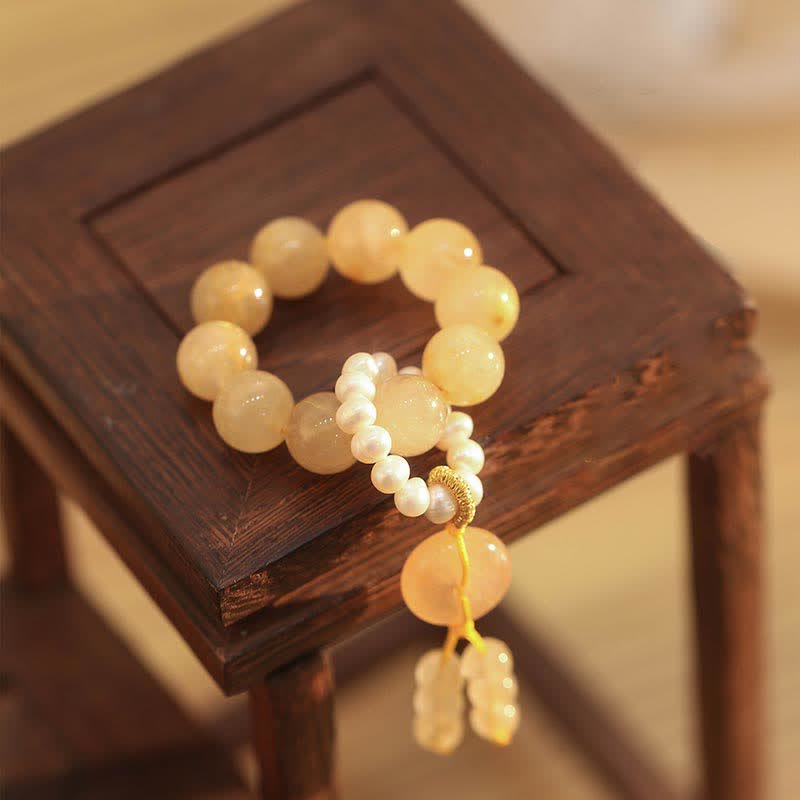 Bracelet Mala en Buddha Stones et citrine avec boucle de paix, prospérité et bonheur