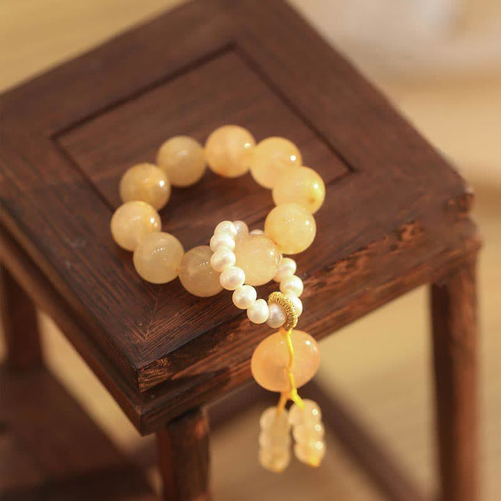 Bracelet Mala en Buddha Stones et citrine avec boucle de paix, prospérité et bonheur