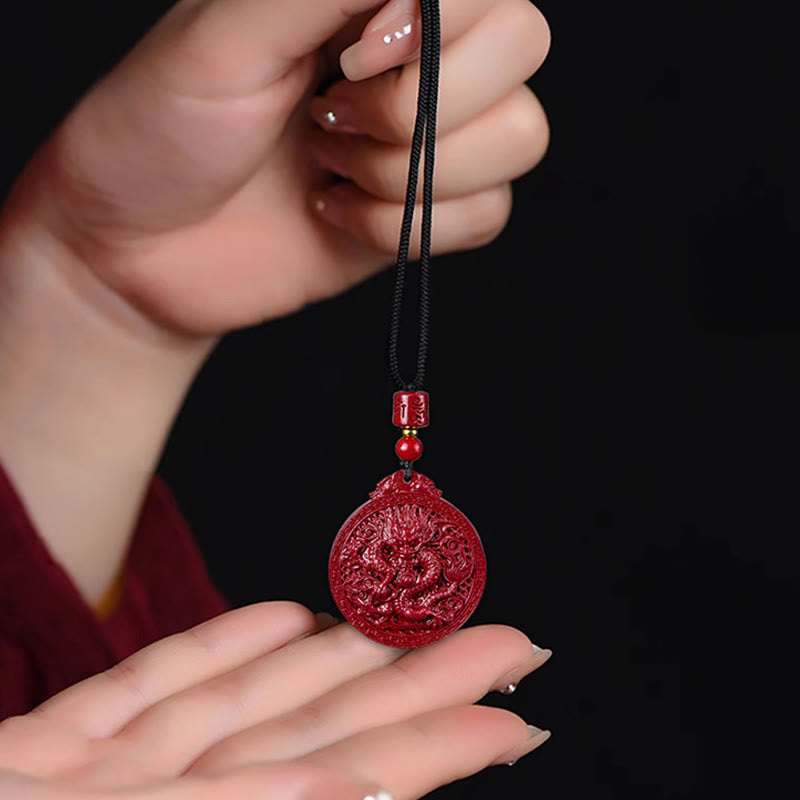 Collier pendentif de protection du dragon en cinabre naturel de l'année du dragon Buddha Stones