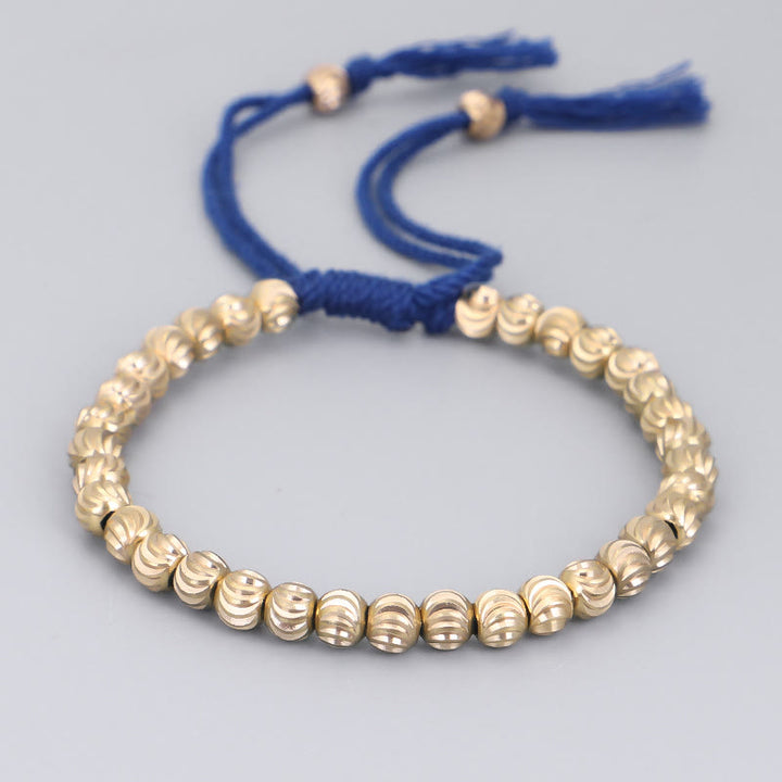 Bracelet porte-bonheur en perles de cuivre tibétaines faites à la main avec Buddha Stones