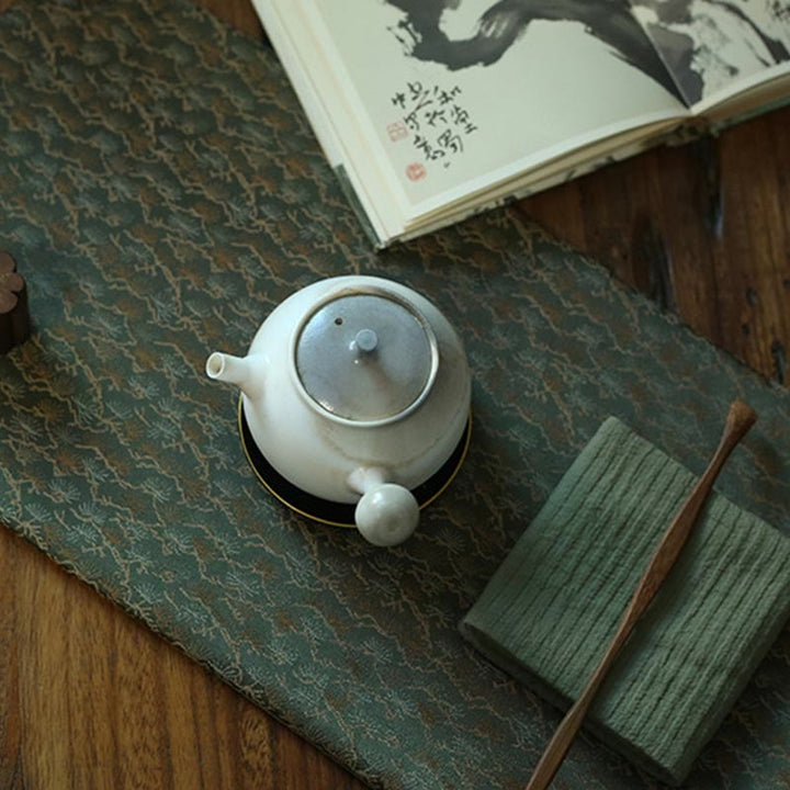 Dessous de verre élégant à motif de brocart floral pour tasse à thé