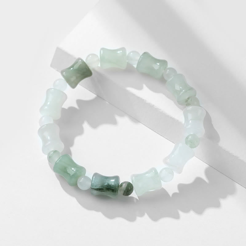 Bracelet porte-bonheur en jade et coquille de noix de coco Buddha Stones et motif bambou