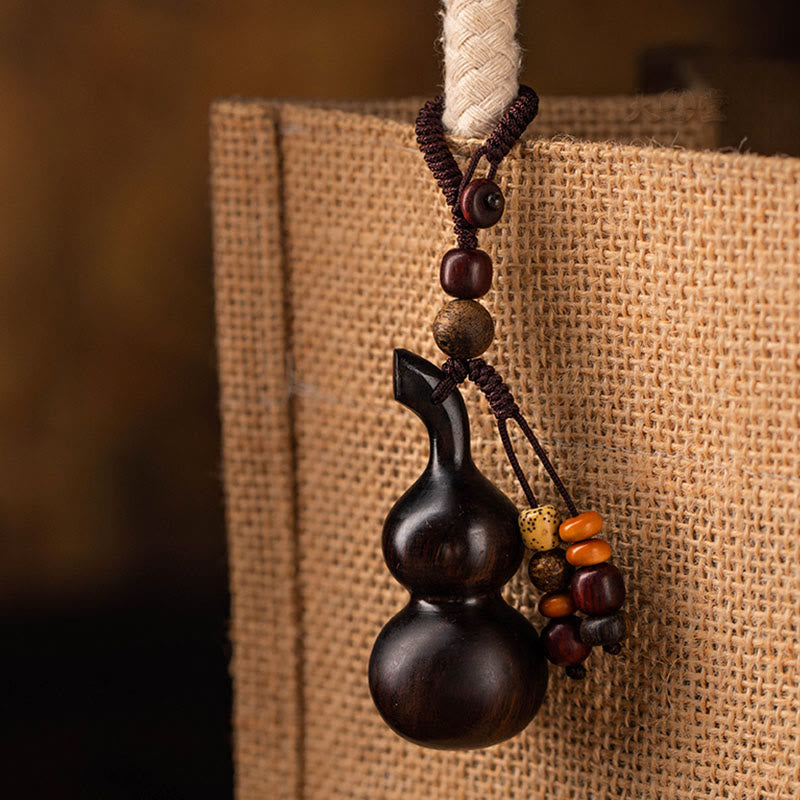Porte-clés porte-bonheur en ébène tibétain à petites feuilles de gourde en bois de santal rouge