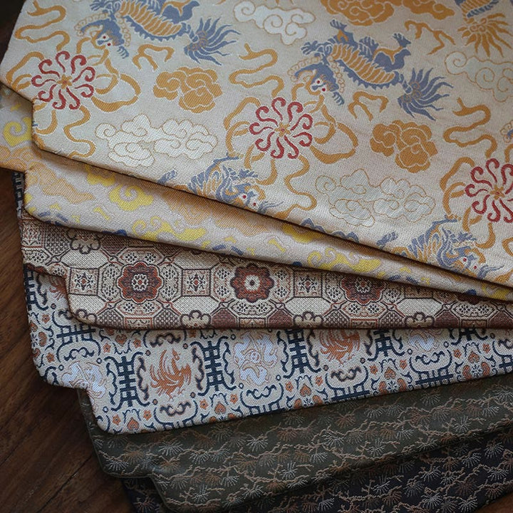 Dessous de verre élégant à motif de brocart floral pour tasse à thé