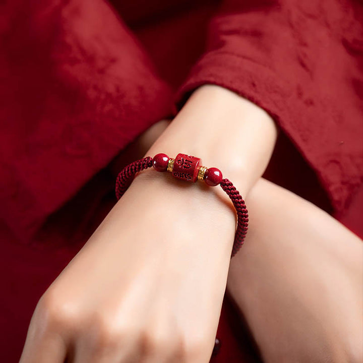 Bracelet tressé avec Buddha Stones tibétaines en cinabre Om Mani Padme Hum gravé et bénédiction
