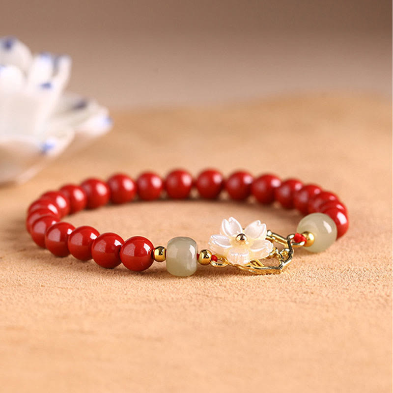 Bracelet de bénédiction en pierre de cinabre naturelle et jade Tridacna avec Buddha Stones