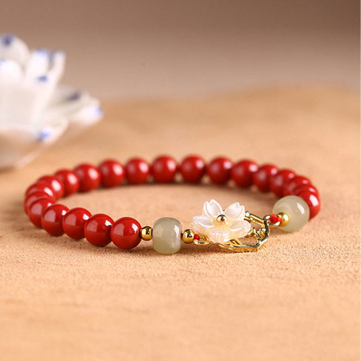 Bracelet de bénédiction en pierre de cinabre naturelle et jade Tridacna avec Buddha Stones