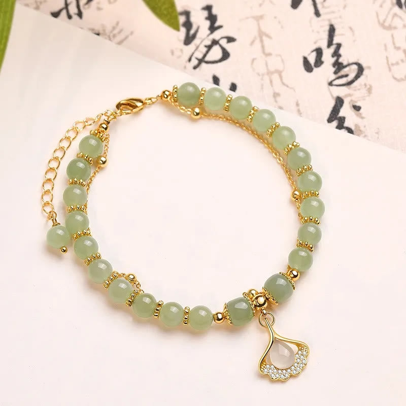 Bracelet de perles porte-bonheur en Buddha Stones, feuille de jade, ginkgo, tulipe, arachide, personnage Fu