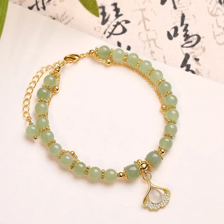 Bracelet de perles porte-bonheur en Buddha Stones, feuille de jade, ginkgo, tulipe, arachide, personnage Fu