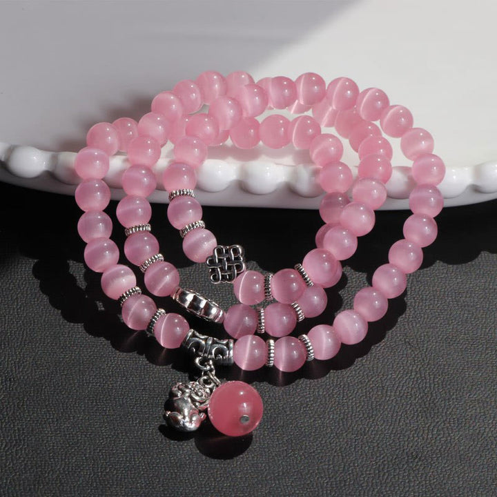 Bracelet triple tour de soutien PiXiu œil de chat en Buddha Stones