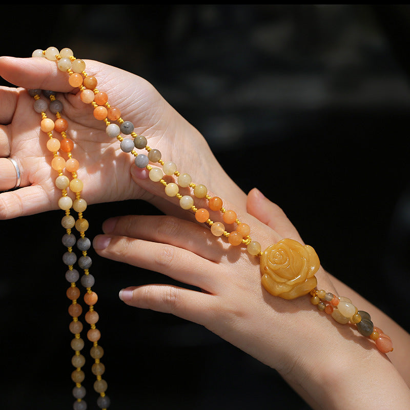 Collier pendentif tibétain en jade doré et soie Buddha Stones