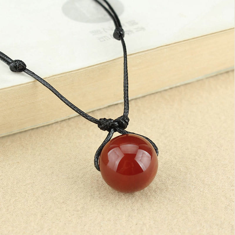 Collier avec pendentif en cuir et perles d'agate rouge de Buddha Stones