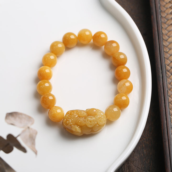 Bracelet de richesse Pixiu en jade et soie dorée avec Buddha Stones