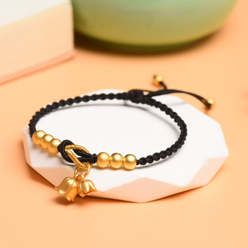 Bracelet tressé fait main en forme de fleur de muguet avec breloque de Buddha Stones