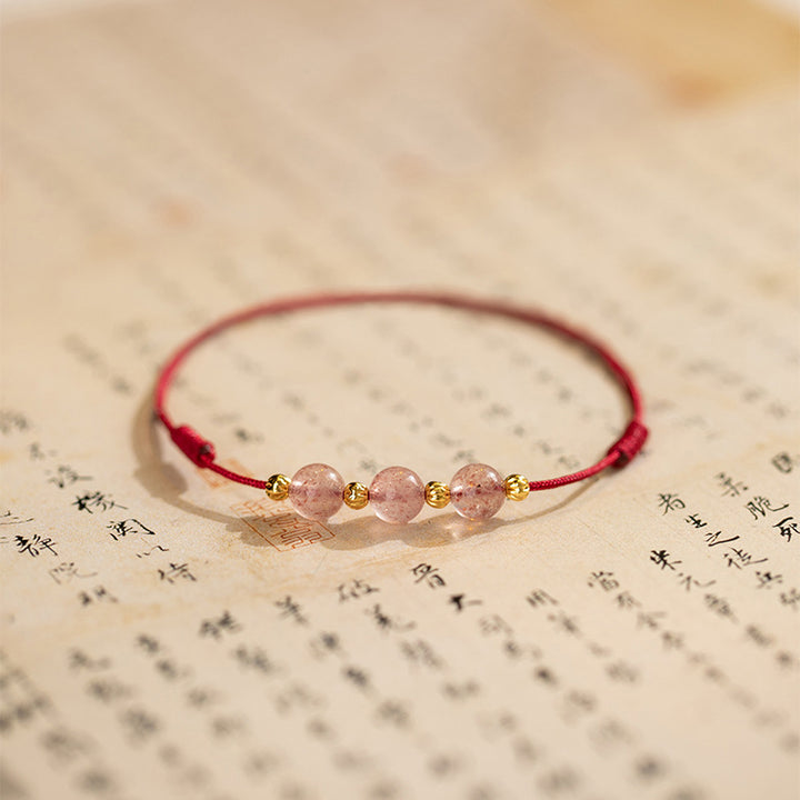 Bracelet de cheville en fil rouge avec perles en cristal de fraise et Buddha Stones