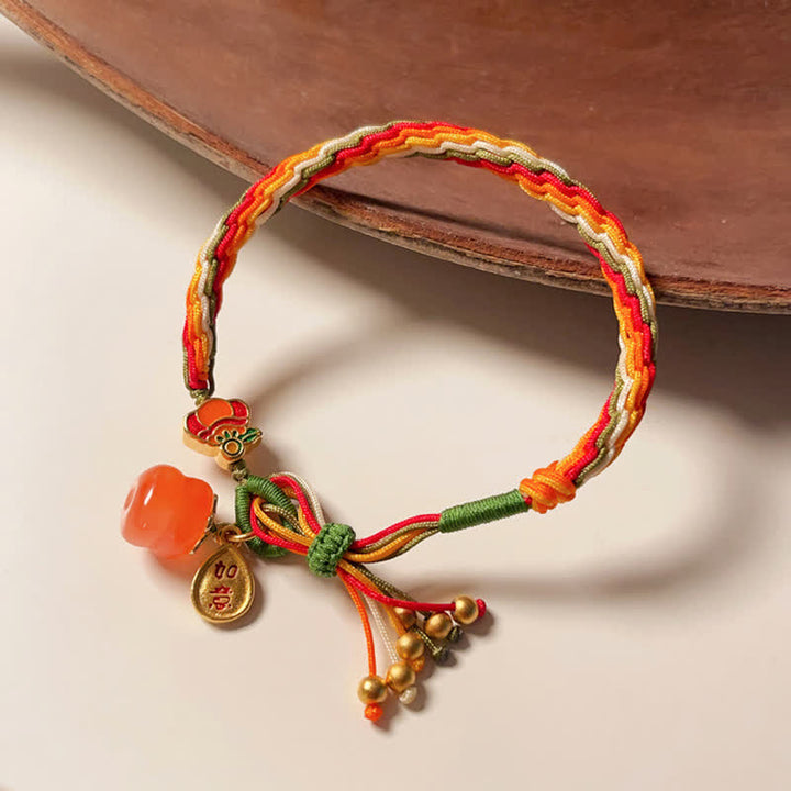 Bracelet tressé en corde avec nœud de force et de réincarnation en agate rouge et Buddha Stones