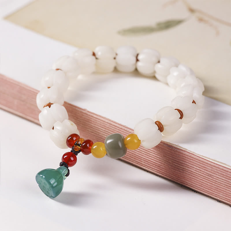 Bracelet en perles de citrouille gravées en agate rouge Bodhi Calme Harmonie Bodhi Graines naturelles Lotus