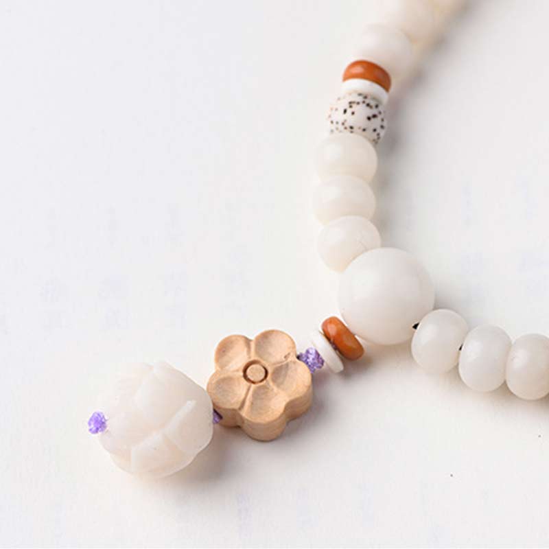 Bracelet de bénédiction Bodhi Lotus en jade blanc tibétain Buddha Stones