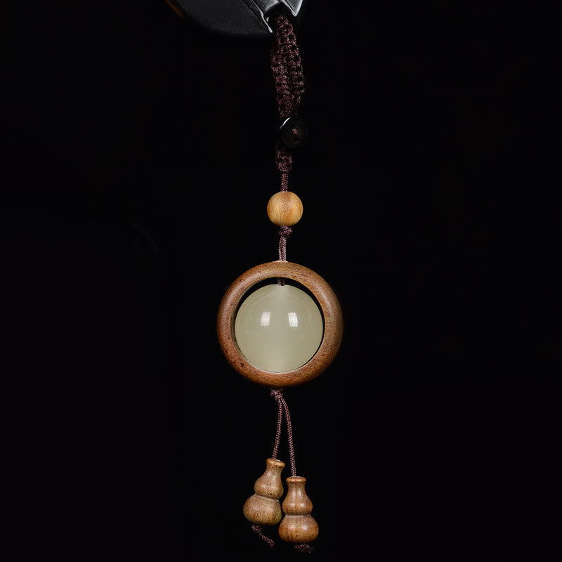 Porte-clés porte-bonheur lumineux en Buddha Stones en bois de santal rouge et bois d'ébène en bois de santal vert