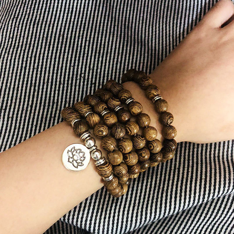 Bracelet tibétain en bois avec Buddha Stones et foudre
