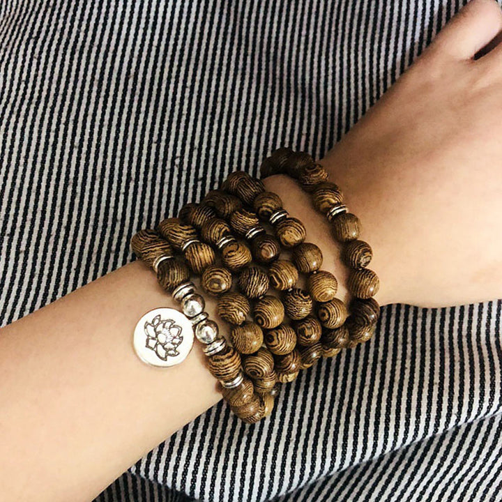 Bracelet tibétain en bois avec Buddha Stones et foudre