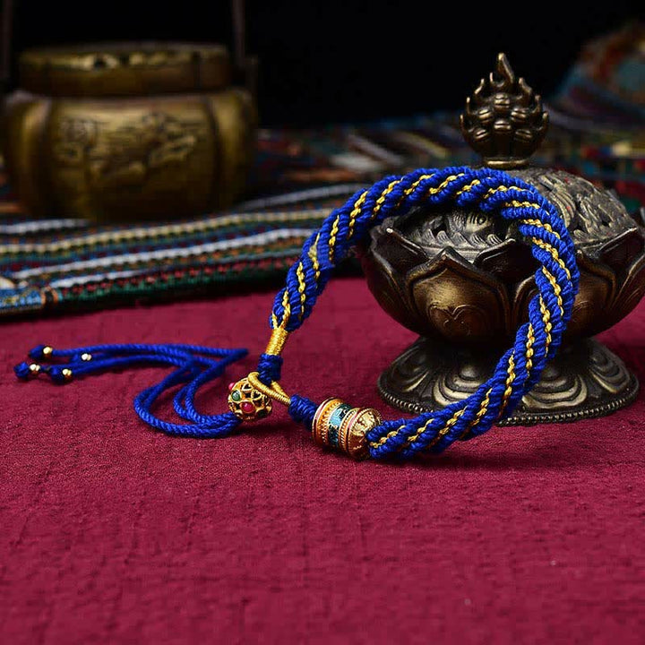 Bracelet tibétain en corde tressée avec breloque porte-bonheur Thangka en Buddha Stones