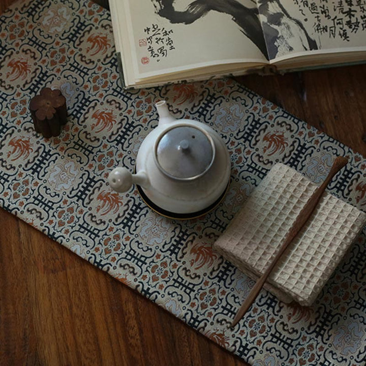 Dessous de verre élégant à motif de brocart floral pour tasse à thé
