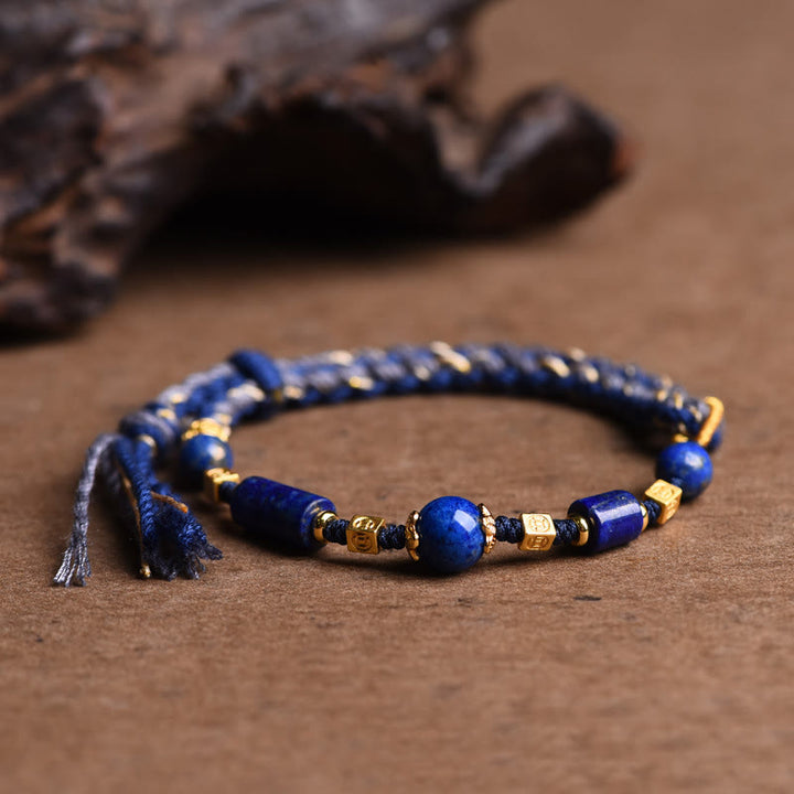 Bracelet en corde positive en perles de lazurite naturelles faites à la main avec des Buddha Stones