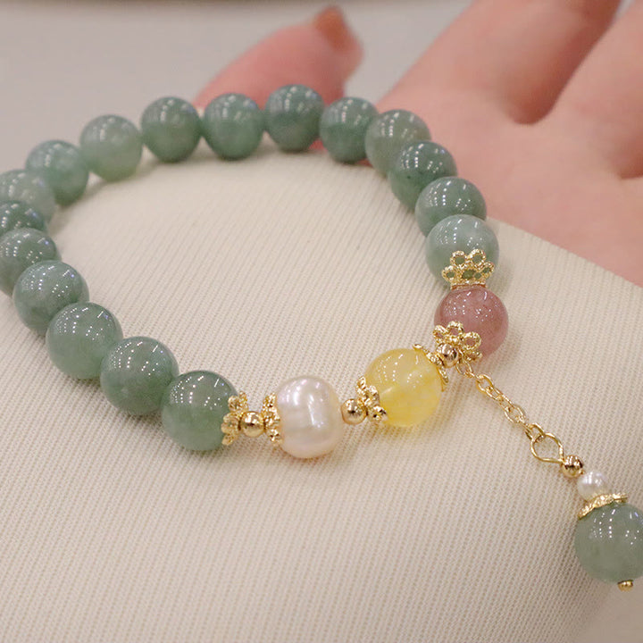 Bracelet porte-bonheur en perles de jade et quartz fraise avec Buddha Stones