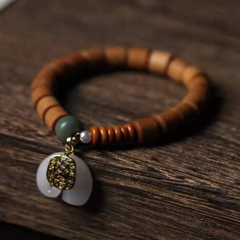 Bracelet de protection éléphant en jade et bois de santal
