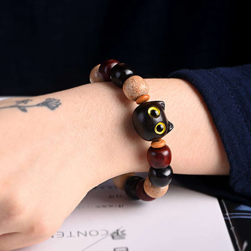 Bracelet de protection gravé en bois de santal rouge et ébène avec petites feuilles de Buddha Stones et chat mignon - image 6