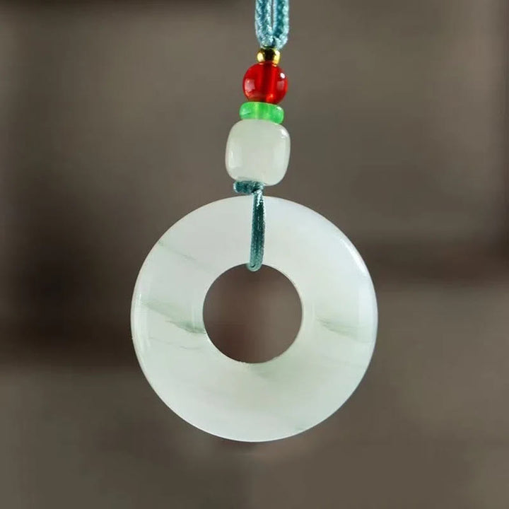 Collier pendentif en jade naturel avec boucle de paix et de prospérité en Buddha Stones