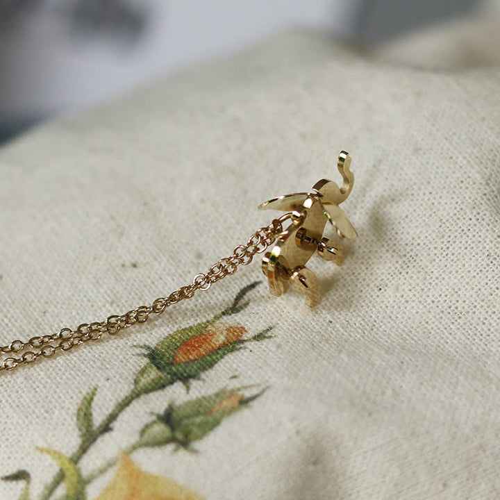 Collier porte-bonheur en acier titane avec pendentif éléphant